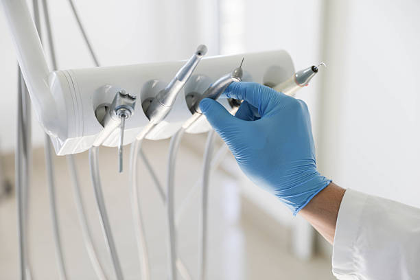 Professional Invisalign Clear Aligners technician working in Saginaw, MI
